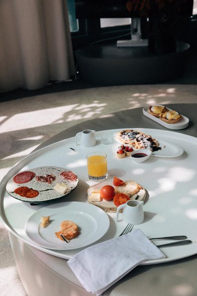 Breakfast tray in dappled morning light