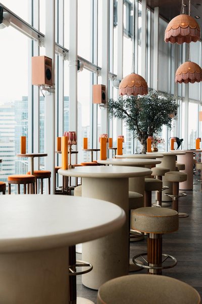 Rooftop bar tables with panoramic windows